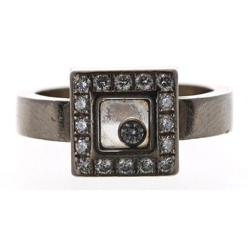 454 - Chopard Happy Diamonds 18ct white gold ring, 271995 82/2896.20, signed, 11.20gm, width 10mm, ring si... 