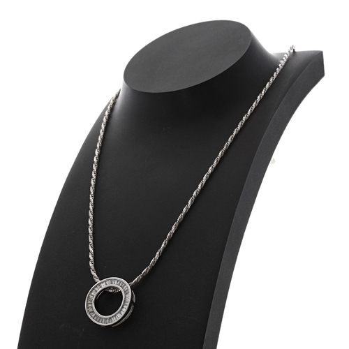 478 - Modern 18ct white gold twisted design necklace with a baguette diamond circular open pendant, 0.90ct... 