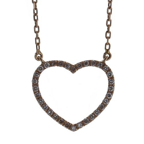 483 - 18ct open heart diamond set pendant and chain, 3.1gm, the pendant 16mm x 17mm (Ref. 301)... 