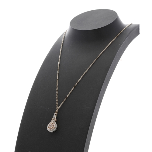 487 - 18ct diamond set pendant with chain by Greg Ruth, the centre pear pink diamond 0.15ct approx, round ... 