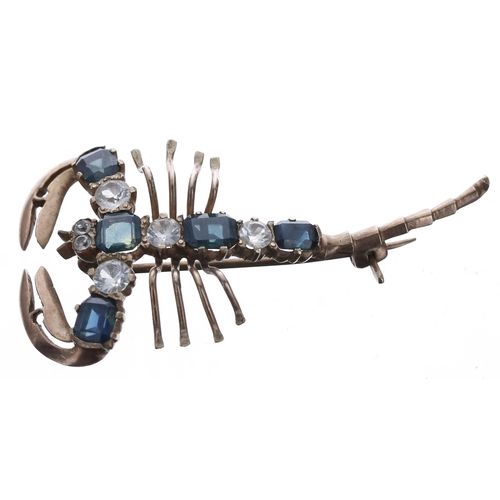 218 - Novelty gold blue and white sapphire set scorpion design brooch, 4.5gm, 48mm