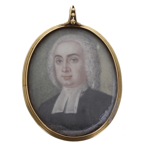 246 - 19th century oval miniature portrait pendant in a yellow metal mount, depicting a portrait of a gent... 