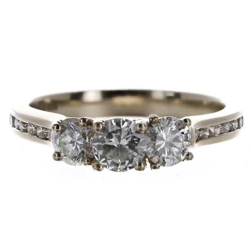 394 - 18ct three stone diamond ring with set shoulders, round brilliant-cut, the three diamonds 0.62ct app... 