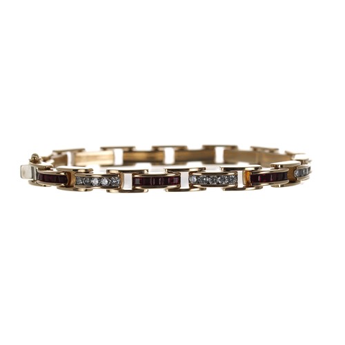 414 - Attractive ruby and diamond yellow gold bracelet, set with calibrated rubies and round brilliant-cut... 