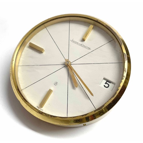 799 - Jaeger LeCoultre brushed brass desk clock, the dial with baton markers and date aperture, 3.75