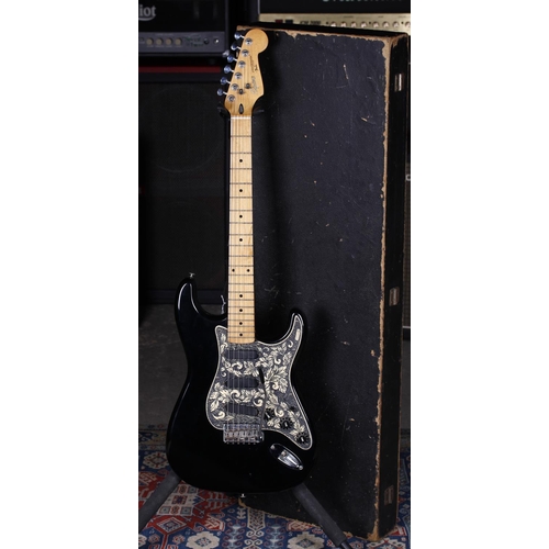 705 - 1980s Squier by Fender Stratocaster electric guitar, made in Korea; Body: black finish, routed to ho... 