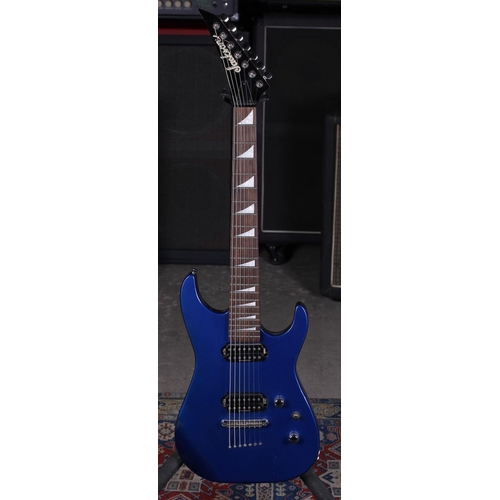Jackson seven string electric guitar; Body: metallic blue finish