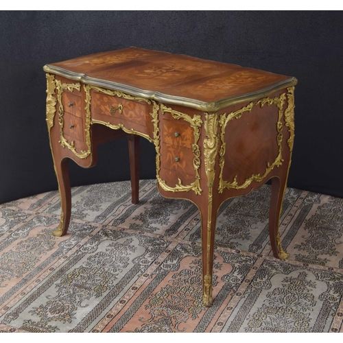 1294 - French Louis XV style marquetry kingwood bureau plat applied with cast gilt metal, with five drawers... 