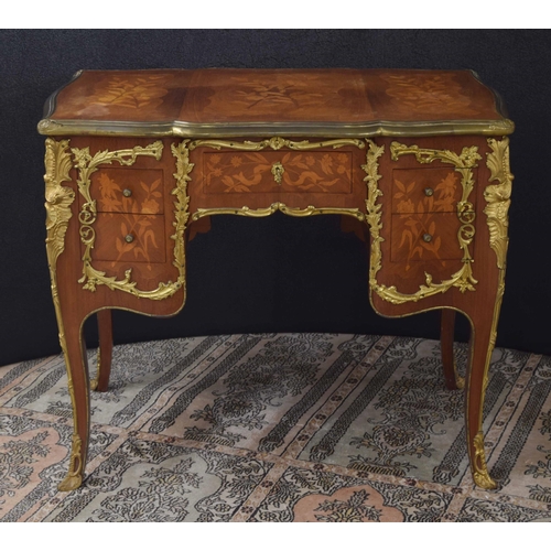 1294 - French Louis XV style marquetry kingwood bureau plat applied with cast gilt metal, with five drawers... 