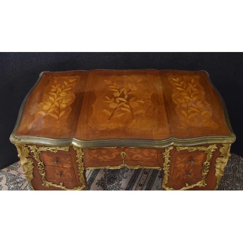 1294 - French Louis XV style marquetry kingwood bureau plat applied with cast gilt metal, with five drawers... 