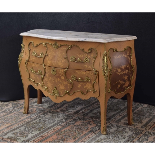 1295 - French marble top bombé commode/chest of drawers in the Louis XV style, the marble top over two marq... 