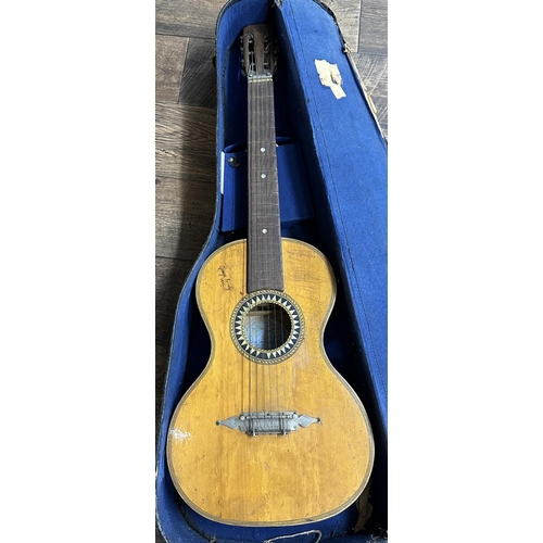 533 - George Formby interest - interesting antique guitar converted to slide action, signed 'George Formby... 