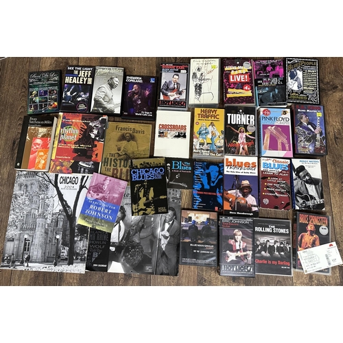 554 - Good selection of books, DVDs and VHS relating to blues and other popular music including a Gibson g... 