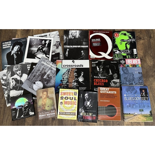 554 - Good selection of books, DVDs and VHS relating to blues and other popular music including a Gibson g... 