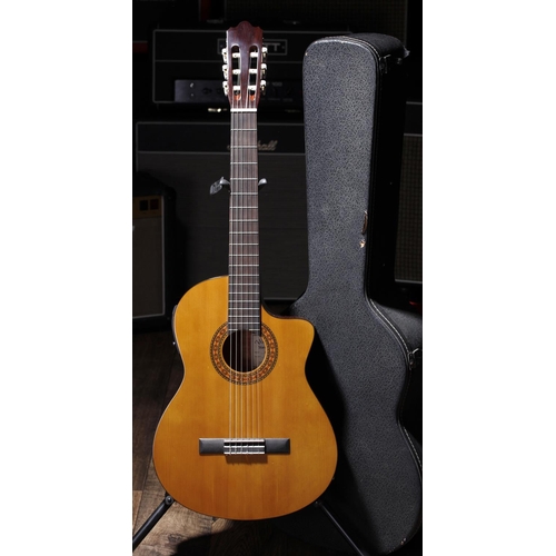 679 - Walden N350CE Standard electro-acoustic nylon string guitar, made in China, within a fitted hard cas... 