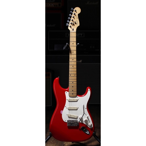 713 - Squier by Fender Stratocaster electric guitar, made in Korea (1987-1988); Body: red finish, blemishe... 