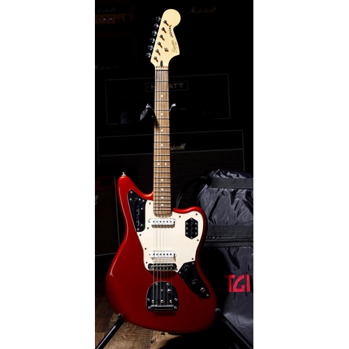 714 - 2013 Squier by Fender Jaguar electric guitar, made in Indonesia; Body: candy apple red finish, surfa... 