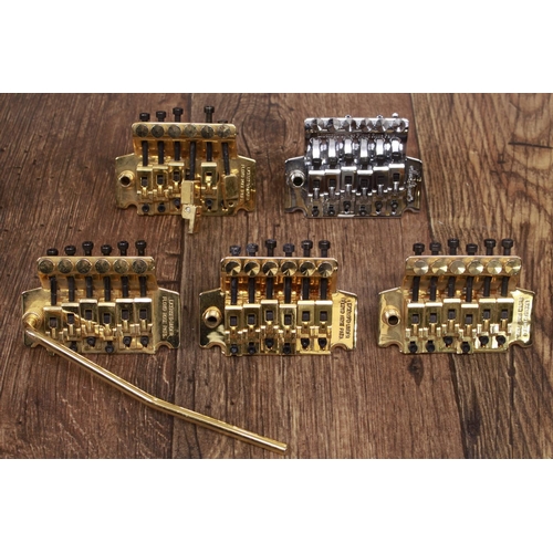 1362 - Chrome Jackson branded licensed Floyd Rose floating tremolo bridge; together with four gold plated l... 