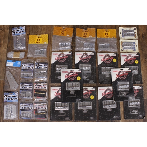 1395 - Large quantity of bass guitar bridges by Wilkinson Parts, Guitar Tech and J.L. Music Parts... 