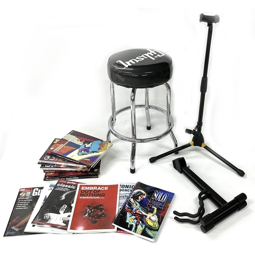 1434 - Gibson guitar stool; together with a Hercules guitar stand and an A-frame guitar stand; also a selec... 