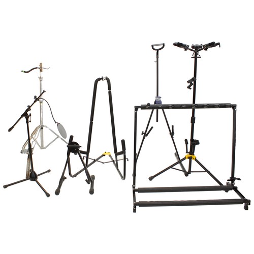 1358 - Selection of guitar stands to include a Hercules three-way guitar tree, a Hercules double bass stand... 