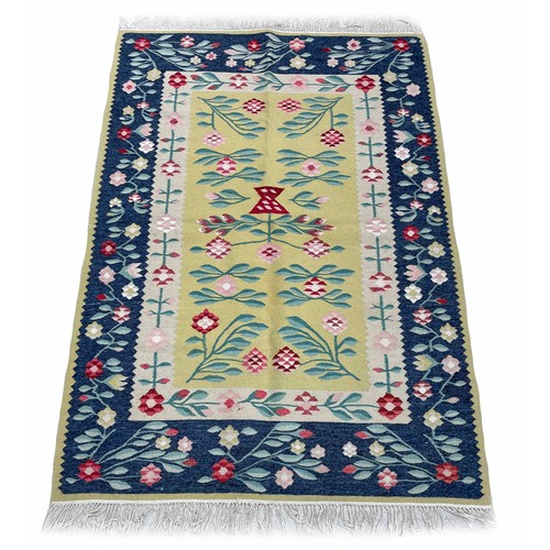 1129 - Decorative floral Kilim type rug, decorated with pink flowers and foliage within floral and foliat e... 