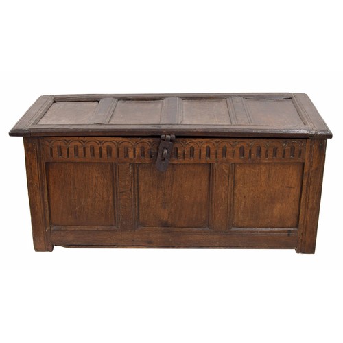 1134 - 18th century and later oak coffer, the hinged four panel top enclosing a open interior, over a tripl... 