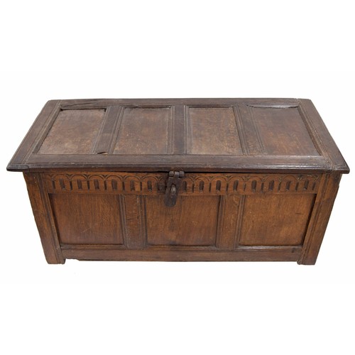 1134 - 18th century and later oak coffer, the hinged four panel top enclosing a open interior, over a tripl... 