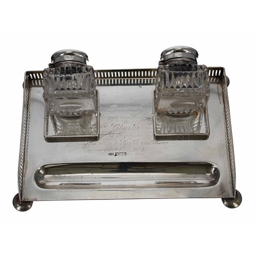 872 - Mappin & Webb silver desk stand with two silver mounted square glass ink bottles, bearing a pres... 