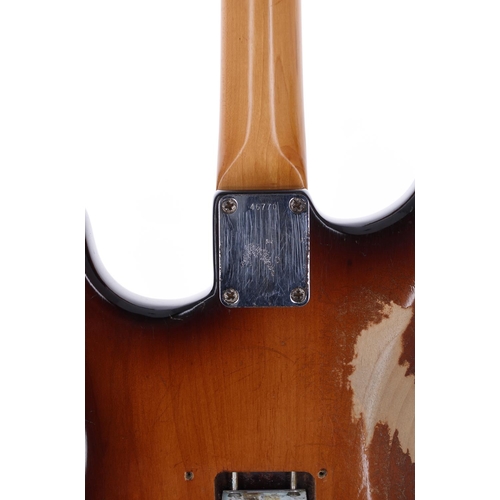 10 - Circa 1960 Fender Stratocaster electric guitar, made in USA; Body: two-tone sunburst refinish, heavy... 