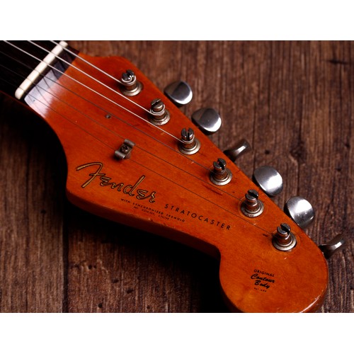 10 - Circa 1960 Fender Stratocaster electric guitar, made in USA; Body: two-tone sunburst refinish, heavy... 