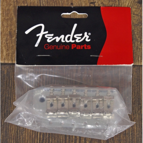 1335 - Fender Genuine Parts vintage Stratocaster guitar bridge assembly, including block, plate and saddles... 