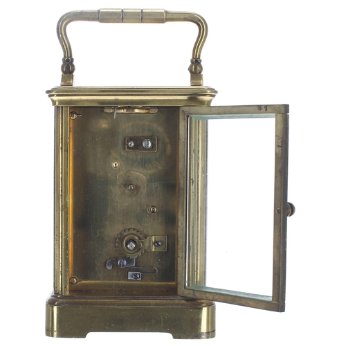 1255 - Carriage clock timepiece within a corniche brass case, 6.75