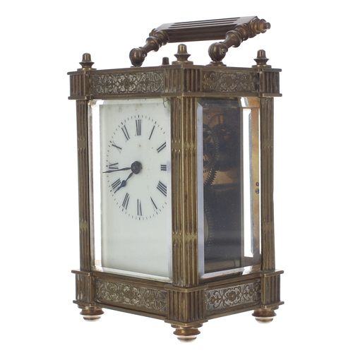 1224 - Carriage clock timepiece, within an ornate fluted pillared case decorated with foliate bands, 6.25