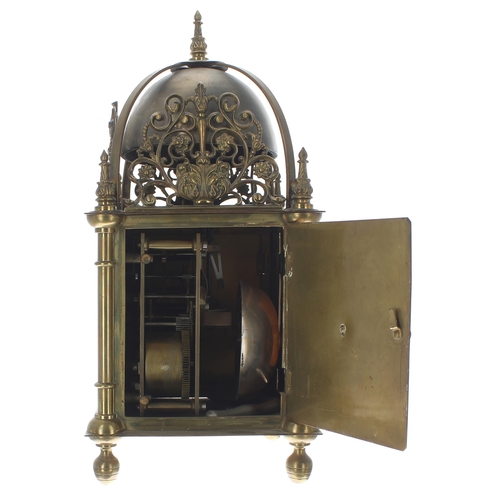 1502 - 19th century brass two train lantern clock, the W&H patent movement striking on a large bell, th... 