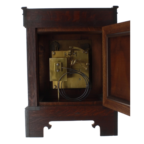 1525 - German Arts & Crafts style oak ting tang mantel clock, the W & H movement striking on two go... 