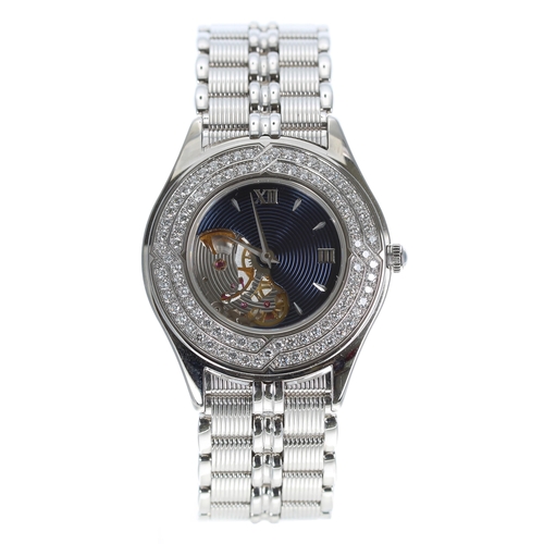 201 - Mauboussin 18ct white gold and diamond lady's wristwatch, reference no. 11863, blue engine turned an... 