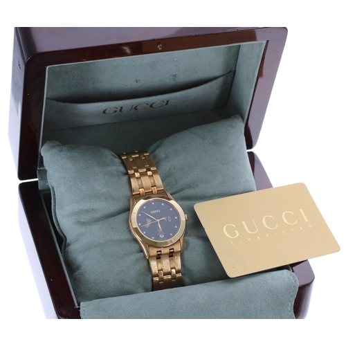 203 - Gucci 18ct gentleman's wristwatch, reference no. 735M, case no. 04x, circa 1995, black dial with the... 