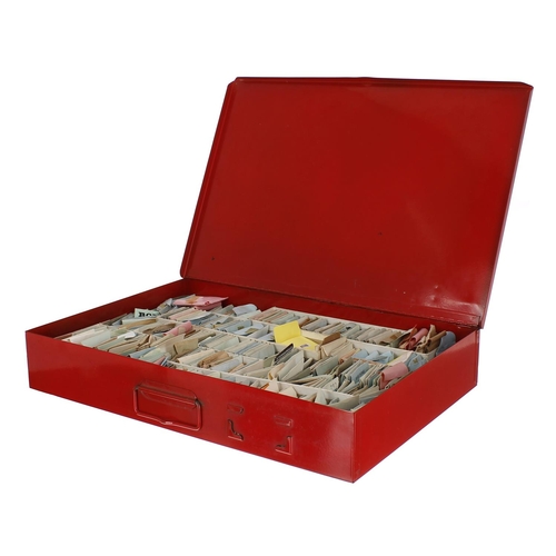 503 - Red metal chest containing a large quantity of watch crystals