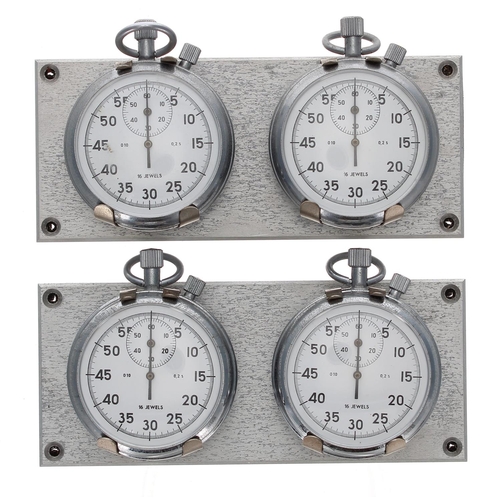 931 - Four chrome cased pocket stopwatches, mounted in pairs upon metal wall mounts