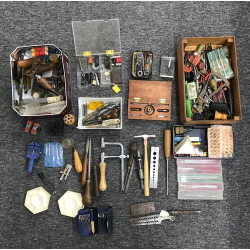 1053 - Large quantity of assorted watchmakers tools contained within a large carry case