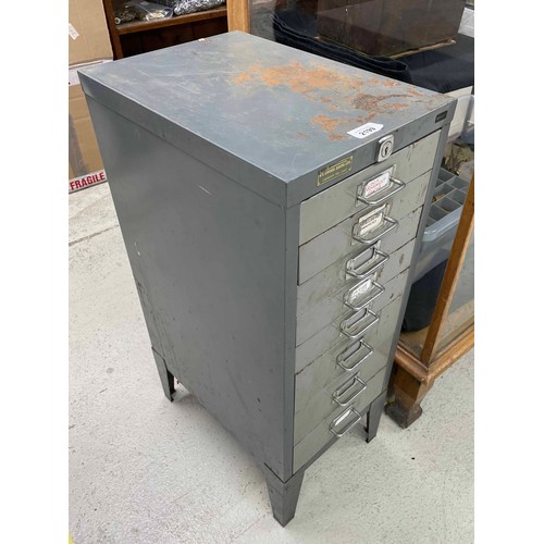 2199 - Small Bisley eight drawer grey metal cabinet containing; a small quantity of clock fittings and keys... 