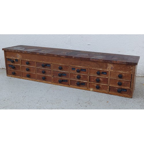 1021 - Watchmaker's twenty one drawer wooden chest with hinged top containing a quantity of parts and acces... 