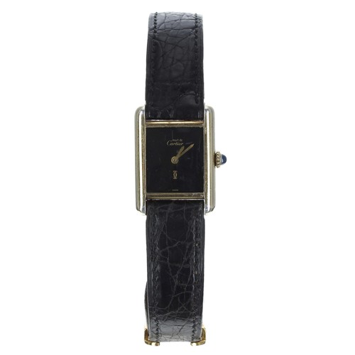 111 - Must de Cartier Tank silver-gilt manual wind lady's wristwatch, case no. 3 063xxx, black dial, cabou... 