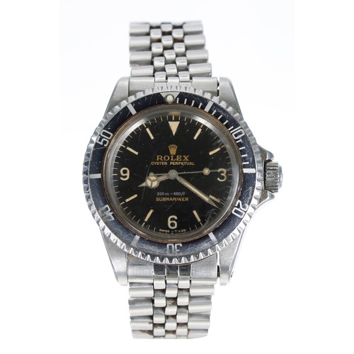 Rare Rolex Oyster Perpetual Submariner stainless steel gentleman's wristwatch with the 3-6-9 Explorer dial, reference no. 5513, circa 1964, black gloss 'Swiss 'T<25' single print dial, with minute markers, hour baton markers, quarter 3-6-9 Arabic numerals, gilt and silvered dial printing 'Rolex Oyster Perpetual 200m=660ft Submariner', Mercedes hands with sweep centre seconds, Oyster case with a black calibrated bezel insert, crown guards with screw-down crown, calibre 1530 26 jewel movement, the case back stamped '5513' and dated 'III.64', Rolex USA jubilee bracelet with 50 end links, case, dial and movement signed, bezel diameter 40mm