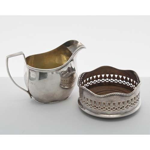 505 - George V silver cream jug, of helmet shape cast with a textured border and the interior gilt, maker&... 