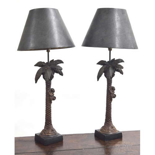 561 - Pair of 'Austin Sculpture Home Collection' resin table lamps, modelled as monkeys climbing palm tree... 