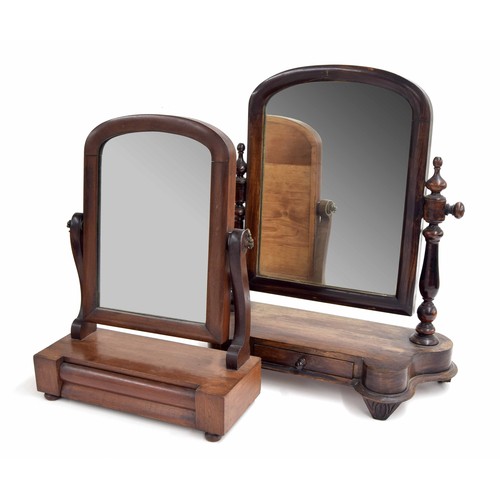 563 - Two 19th century mahogany swing mirrors, both with arched glass supported over single drawer bases, ... 