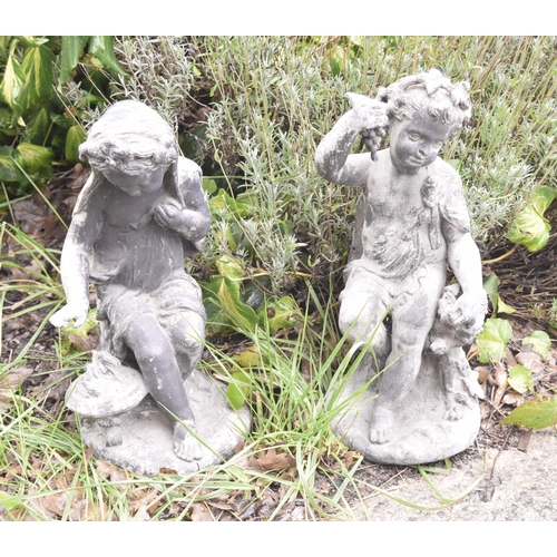 567 - Pair of small lead figural statues, depicting two of the four seasons, of a putti figure with grapes... 