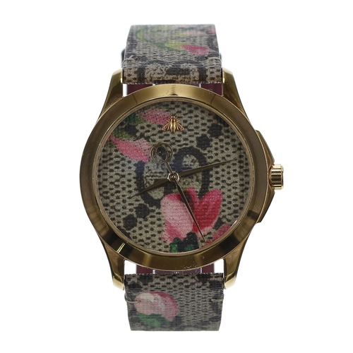 142 - Gucci G-Timeless Pink Blooms gold plated and stainless steel lady's wristwatch, reference no. 126.4,... 